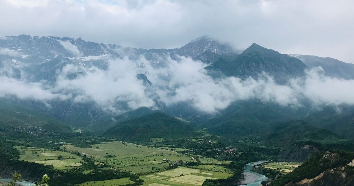 Valleys and cloud-covered mountains in Përmet, Albania