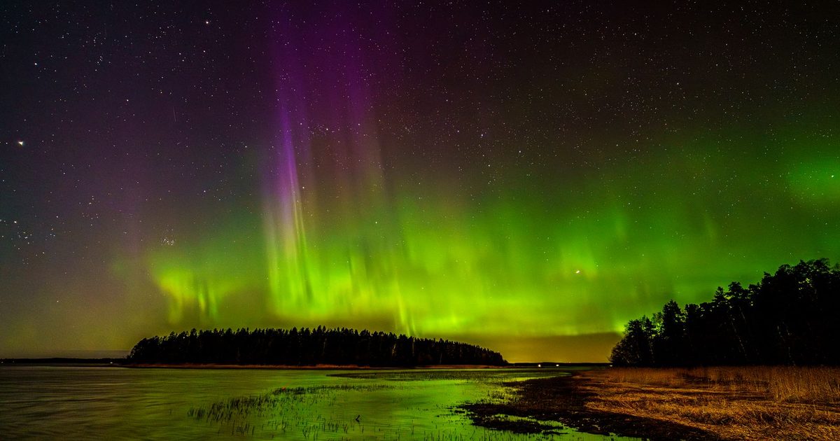 The aurora borealis over the shoreline at Askainen, Finland