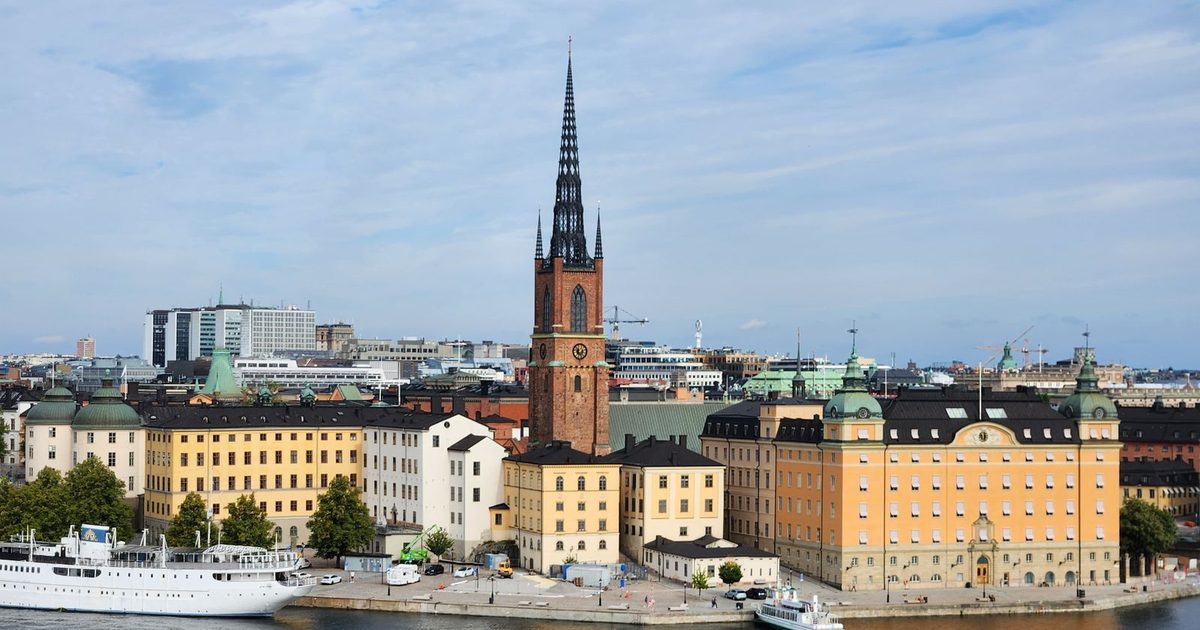 Riddarholmen Church and colourful buildings in Stockholm, Sweden