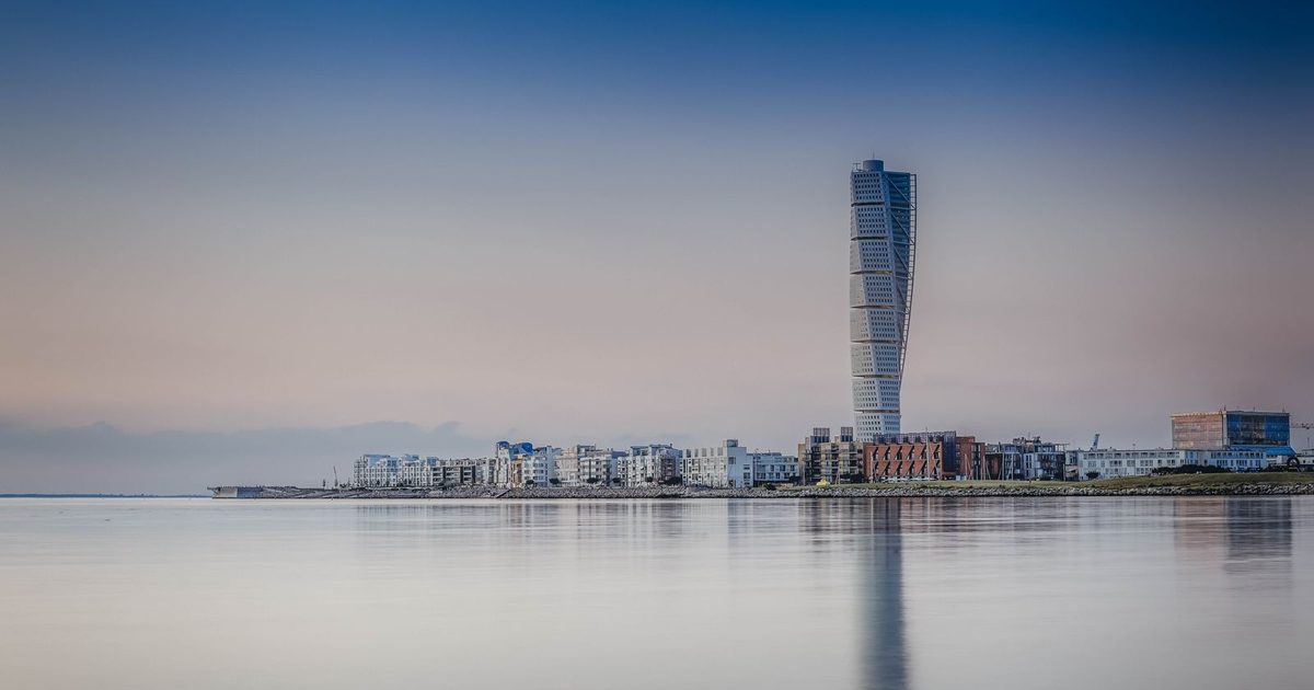 The Turning Torso tower reflected in the sea, Malmö, Sweden